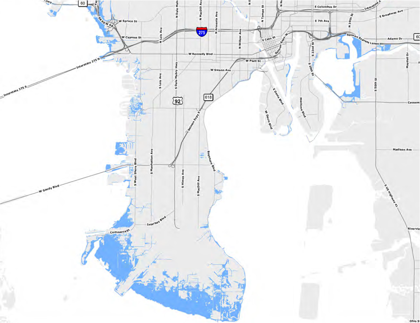 Map showing a coastal area with highways and land elevation, highlighting regions prone to flooding in blue.