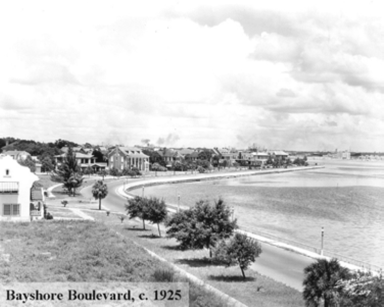 Historic black and white photo of Bayshore Boulevard, c. 1925, showcasing residential houses along the waterfront.