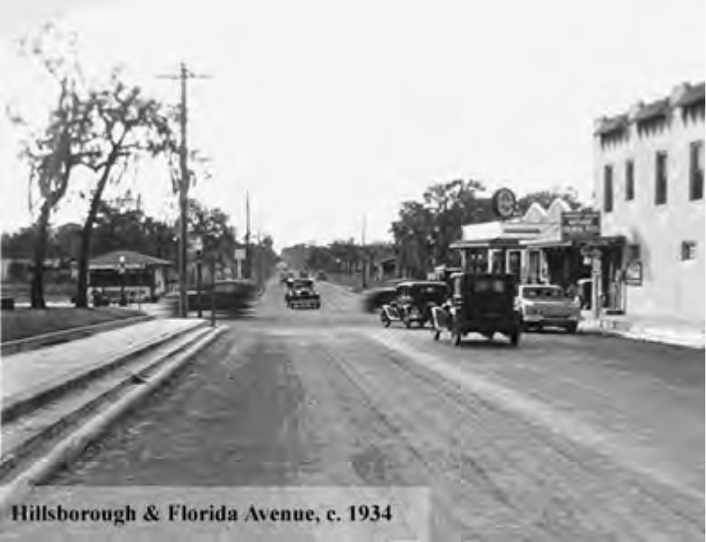 Historic intersection of Hillsborough and Florida Avenue, c. 1934, featuring early 20th-century cars and buildings.