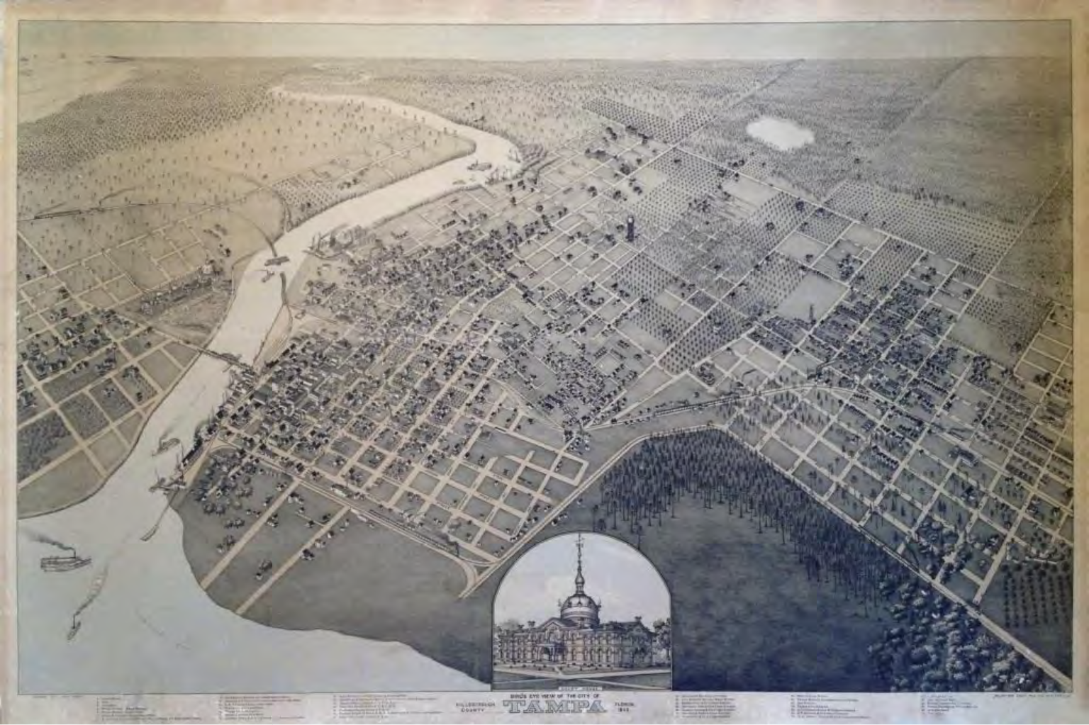 An aerial view map of a city featuring streets, buildings, and natural landscapes, with a detailed inset of a notable building.