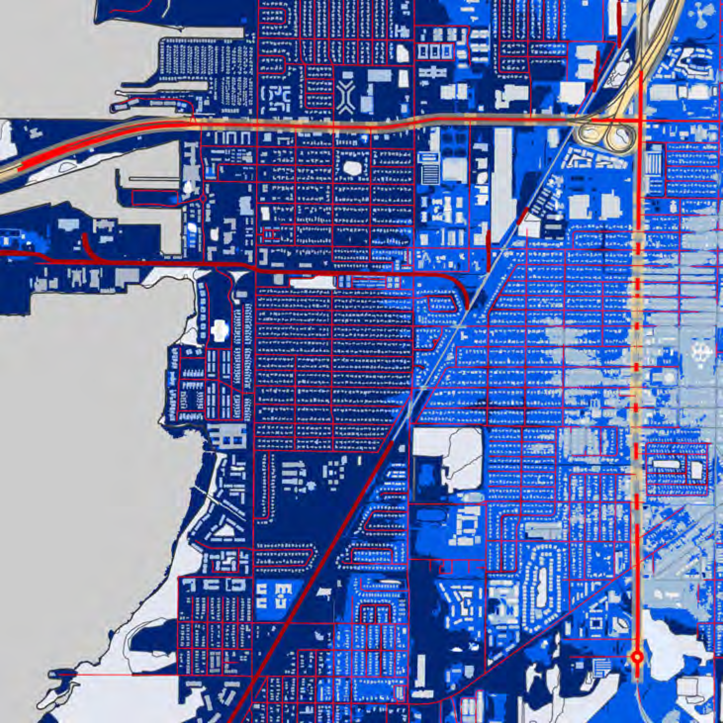 Urban map featuring roads and neighborhoods, predominantly in blue tones with red outlines for key areas and routes.