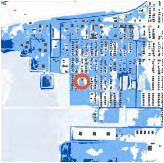 Map with areas shaded in blue and orange circle marking a specific location.