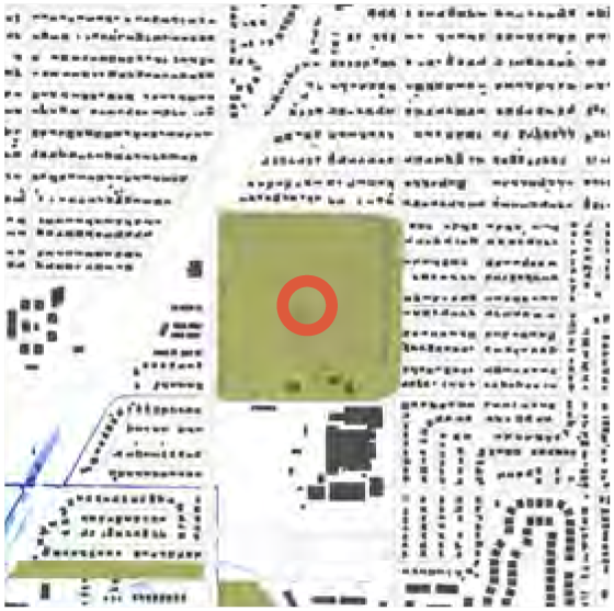 Map view showing a park marked with a red circle, surrounded by streets and residential areas.