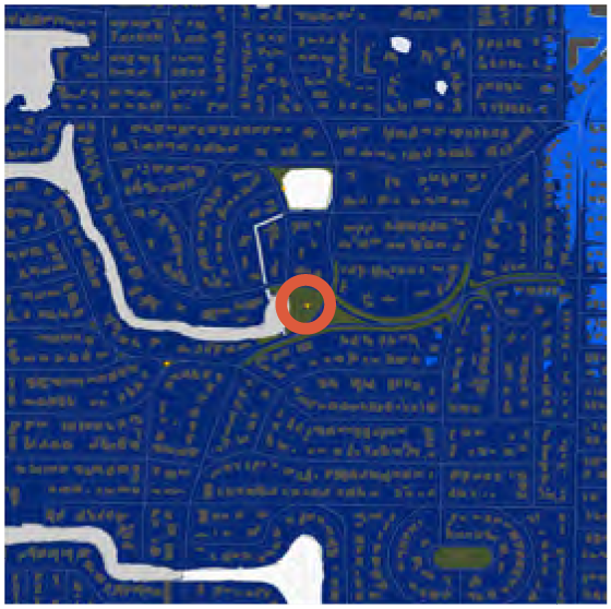 Map showing a neighborhood with streets and a central highlighted point in orange.