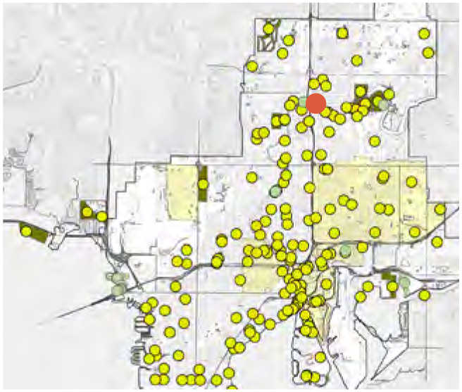 Map displaying numerous yellow and red dots representing various points of interest or data locations in an urban area.