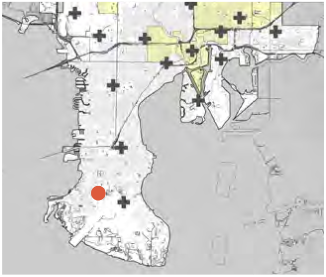 Map showing a highlighted area with symbols and a red dot indicating a specific location.