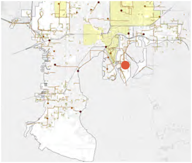 A map displaying various roads and landmarks, with highlighted areas and a red dot indicating a specific location.