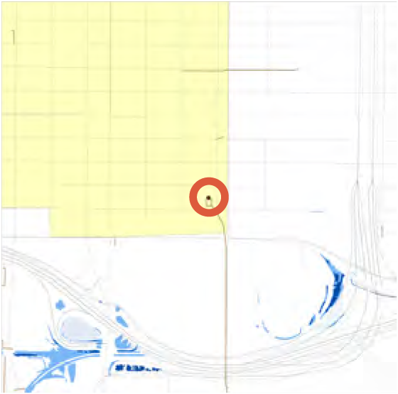Map showing a highlighted area in yellow with a red circle marking a specific location.
