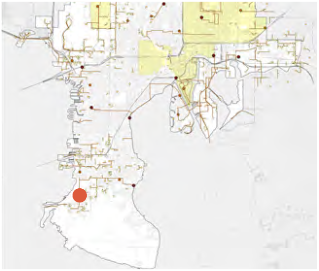 A simplified map showing roads, paths, and geographic features with a highlighted red dot in the southwestern area.