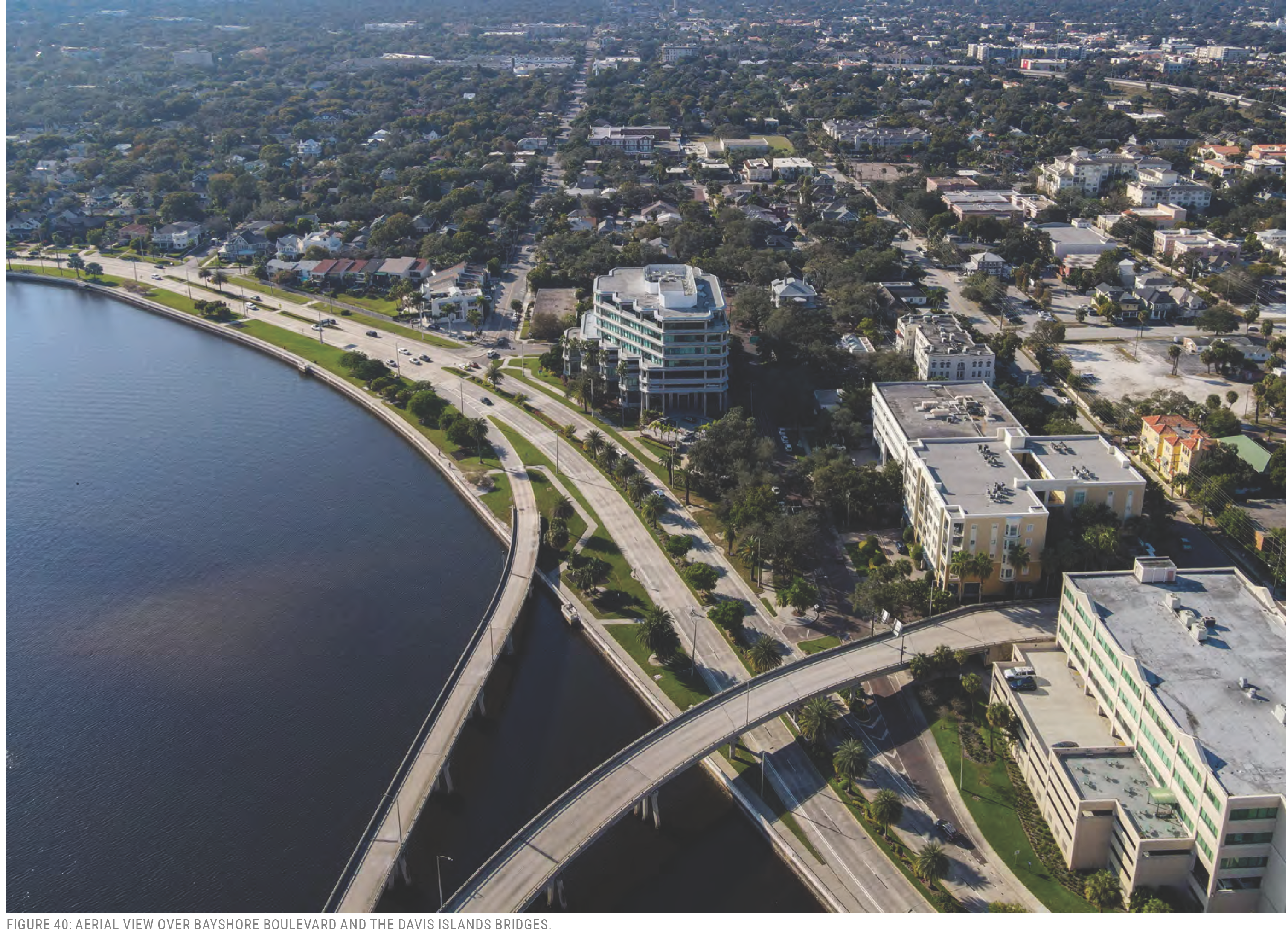 Aerial view over Bayshore Boulevard and the Davis Islands bridges, showcasing urban development and waterfront scenery.