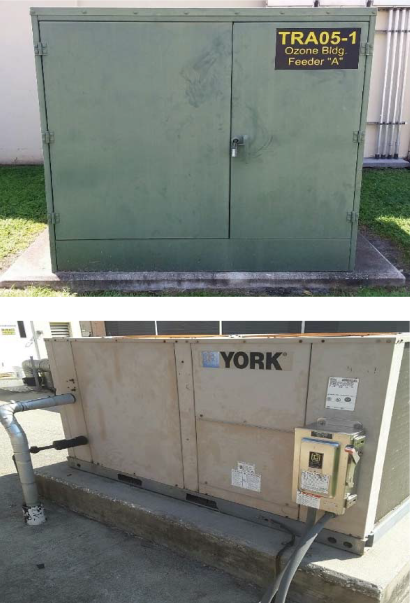 Two utility enclosures: one green with a sign labeled 'TRA05-1 Ozone Bldg Feeder A', and one beige unit labeled 'YORK'.