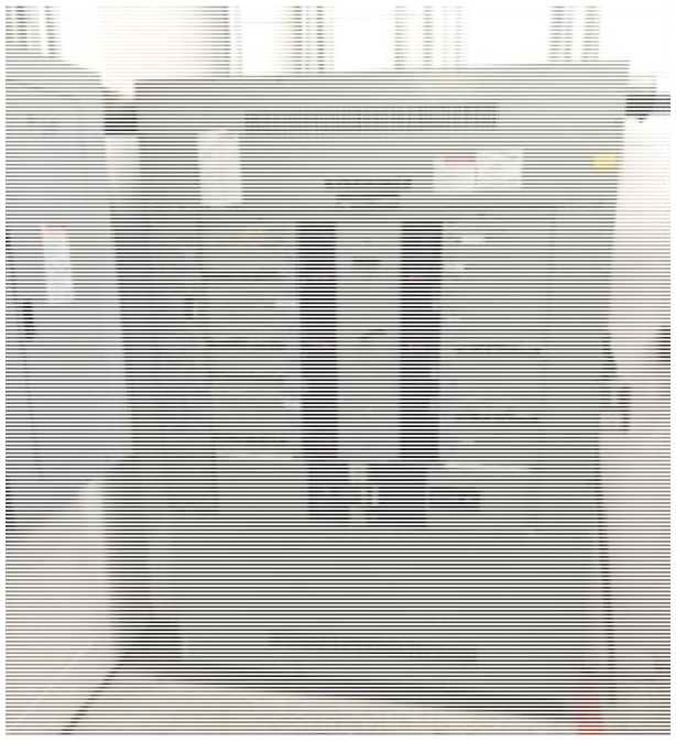 Electrical control panel with multiple switches and indicators, housed in a white cabinet, located in a technical environment.