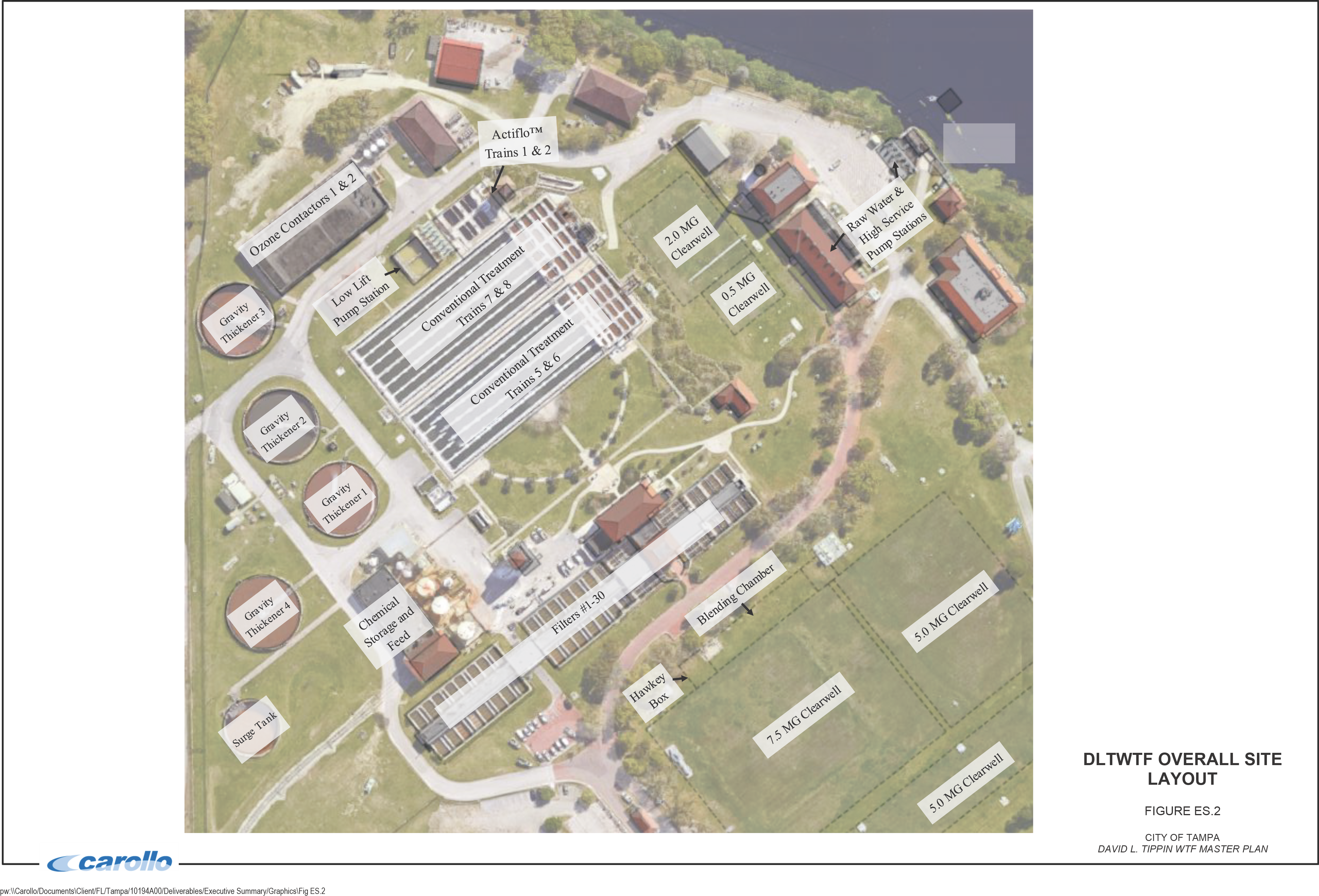 Aerial view of a site layout with labeled buildings, training areas, and parking spaces, surrounded by greenery.