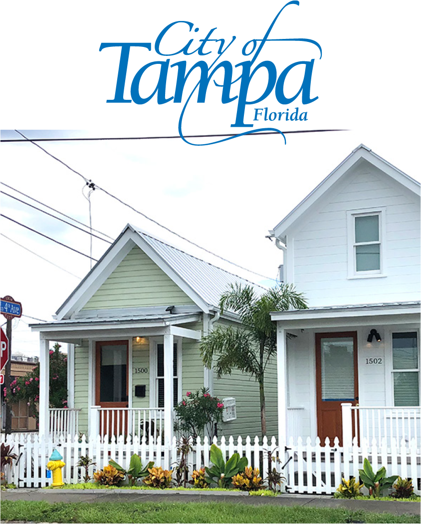 Two houses side by side with a white picket fence, featuring tropical plants and a sign saying 'City of Tampa, Florida'.