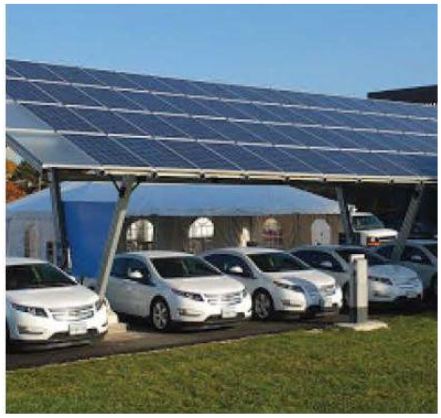 A solar carport with multiple electric cars parked underneath, showcasing renewable energy use.