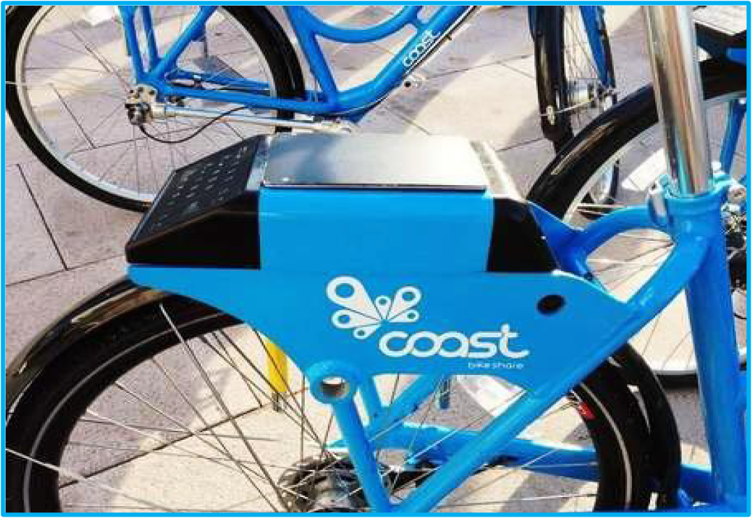 Close-up of a blue bike-sharing bicycle with a black control panel and the logo 'coast' prominently displayed.