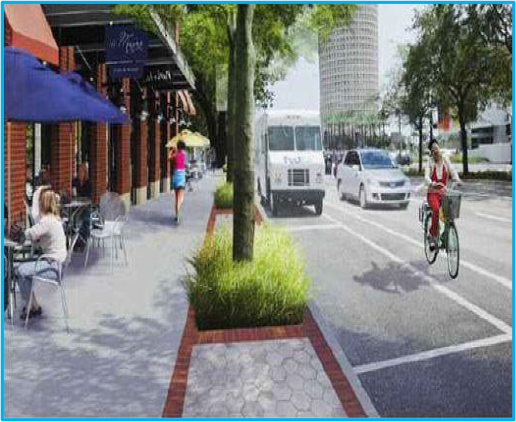 A street scene with outdoor cafes, pedestrians, a cyclist, and a bus on a city road, surrounded by greenery.