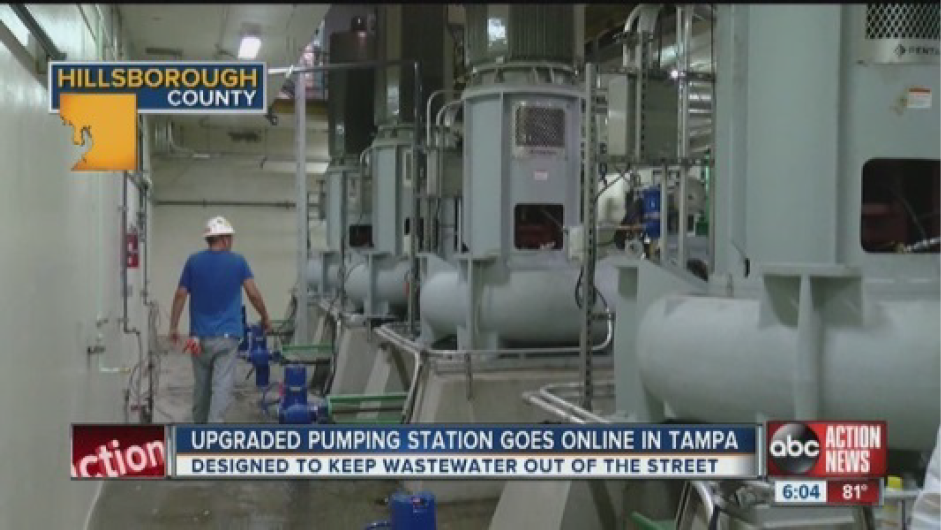 Inside view of an upgraded pumping station in Tampa with workers and machinery, designed to manage wastewater.